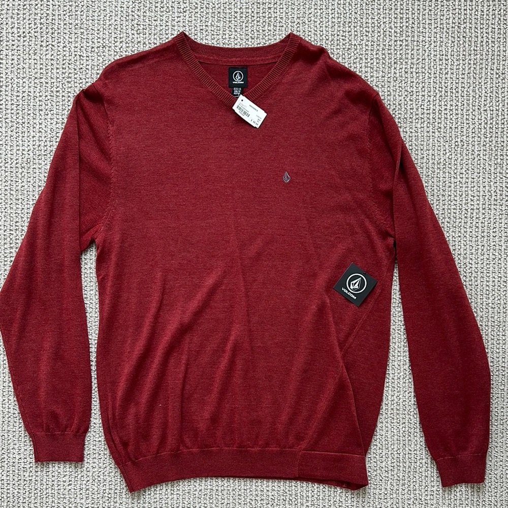 Men’s Volcom long sleeve sweater. New with tags.
